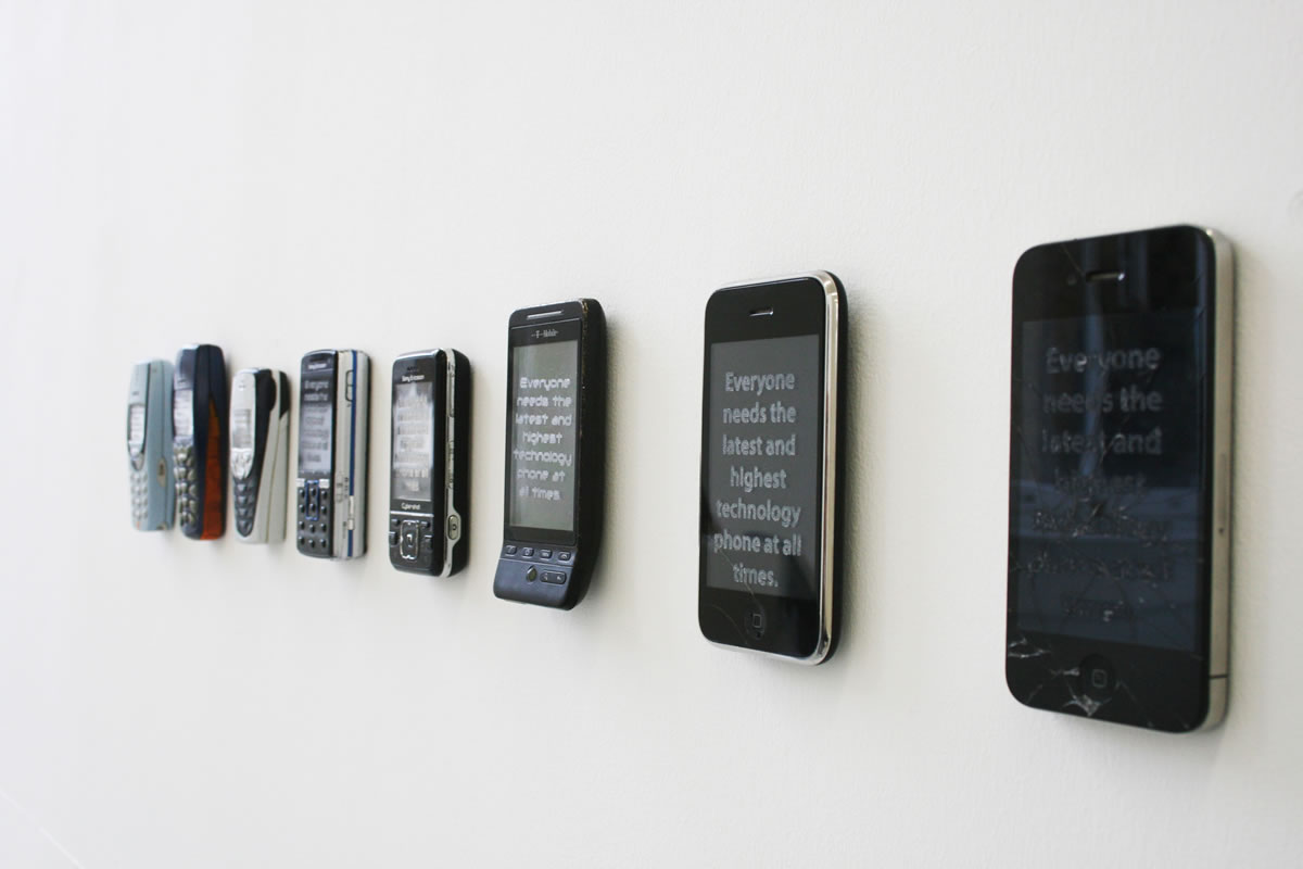 'Iteration 1' - Laser engraved text from internet on selection of phones, 2015